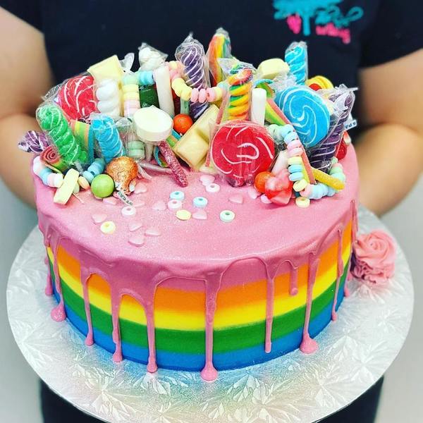 Smooth Rainbow with Pink Drip and Rainbow Overload Toppings