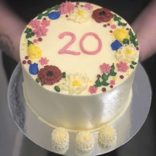 Smooth Cream with Piped Flowers