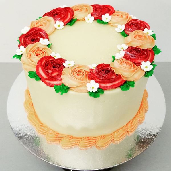 Smooth Cream Cake with Red and Peach Roses
