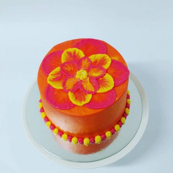 Smooth Orange with Yellow and Pink Flower Cake