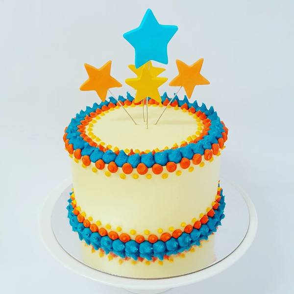 Smooth With Orange and Blue Stars Cake