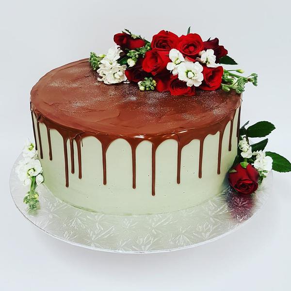 Smooth Grey cake with Chocolate Drip and Fresh Flowers